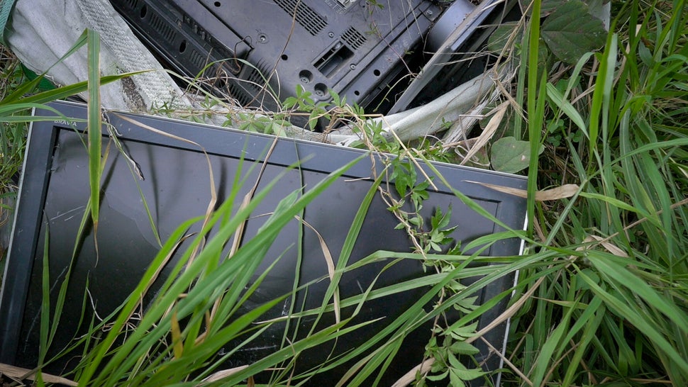 Old computers piled in a junkyard in rural Hong Kong.