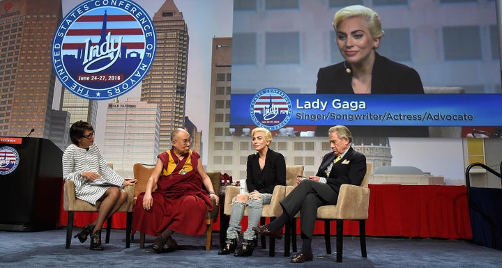 Lady Gaga joins his Holiness the Dalai Lama to speak to US Mayors about kindness at JW Marriott on June 26, 2016 in Indianapolis, Indiana.