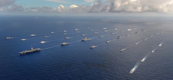 More than 40 ships and submarines representing 15 international partner nations travel in formation during Rim of the Pacific