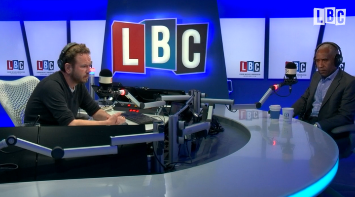 <strong>A caller named Karen told James O'Brien (left) and Simon Woolley that she had been targeted by her neighbours following Friday's Brexit result</strong>.