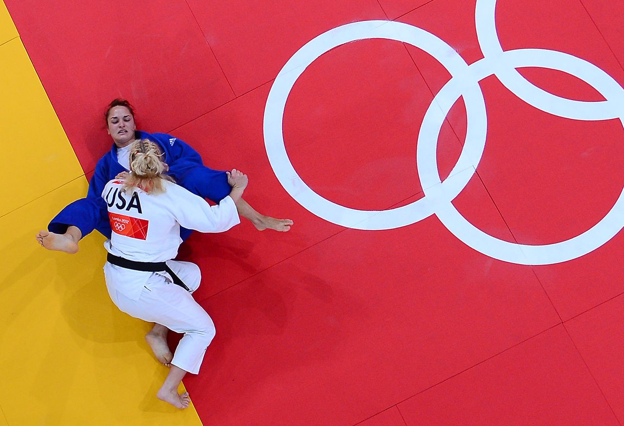 Harrison and Hungary's Abigel Joo compete at the 2012 Olympic Games.