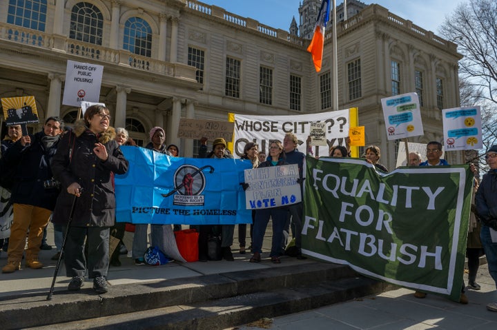 Activists from East Harlem and other neighborhoods rally against a major component of New York City Mayor Bill de Blasio's af