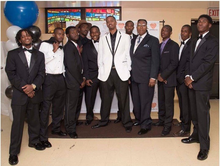 Attendees, striking a pose in their formalwear.