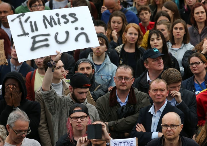 Liberal Democrat leader Tim Farron (below right, blue shirt) joins people at an anti-Brexit protest in Trafalgar Square