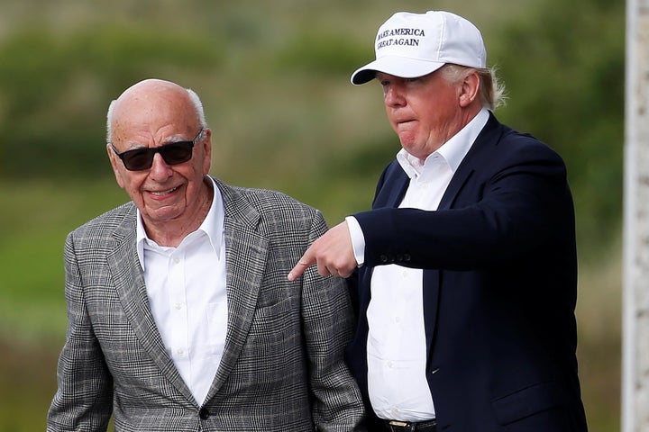 Donald Trump and Rupert Murdoch at the Trump International Golf Links in Aberdeen on 25 June 2016 