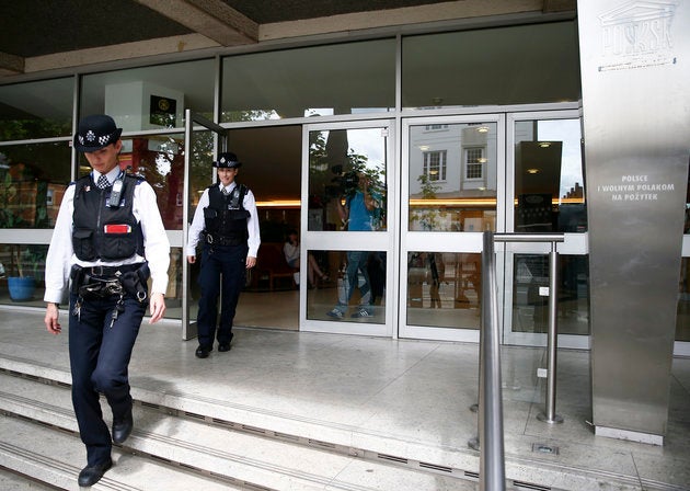 Police officers leave the Polish Social and Cultural Association after <a href="http://www.huffingtonpost.co.uk/entry/polish-community-centre-in-hammersmith-has-graffiti-daubed-on-its-doors_uk_576fcc8fe4b0232d331e23b9" role="link" class=" js-entry-link cet-internal-link" data-vars-item-name="graffiti was daubed on the side of the building" data-vars-item-type="text" data-vars-unit-name="5773a28de4b0220ef54fc1f5" data-vars-unit-type="buzz_body" data-vars-target-content-id="http://www.huffingtonpost.co.uk/entry/polish-community-centre-in-hammersmith-has-graffiti-daubed-on-its-doors_uk_576fcc8fe4b0232d331e23b9" data-vars-target-content-type="buzz" data-vars-type="web_internal_link" data-vars-subunit-name="article_body" data-vars-subunit-type="component" data-vars-position-in-subunit="1">graffiti was daubed on the side of the building</a>