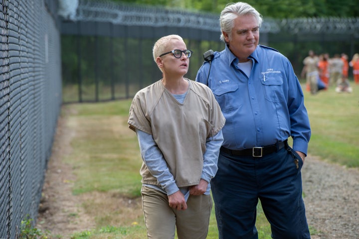 Lori Petty and Michael J. Harney star in a scene from Season 4 of "Orange is the New Black."