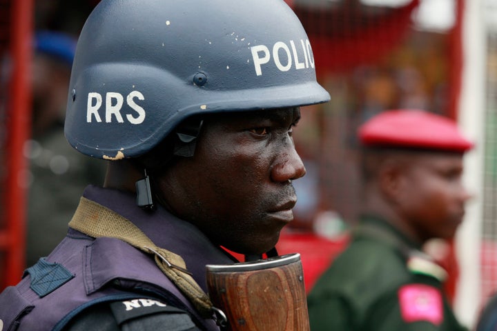 A police officer stands guard in Lagos, Nigeria, on May 1, 2014.