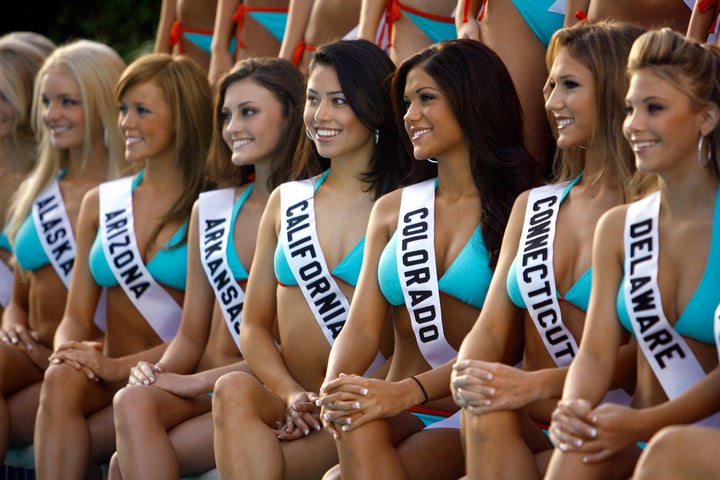 Miss Teen USA 2007 contestants pose in swimsuits in Pasadena, California. The pageant announced Tuesday that it would have contestants compete in athletic wear instead of swimwear. 