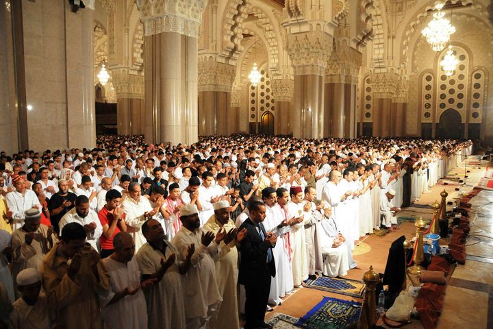 Moroccan faithful pray on the esplanade of the Hassan II Mosque on Laylat al-Qadr during the holy month of Ramadan, in Casablanca August 15, 2012.