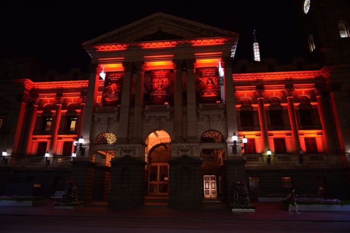 Municipality of Melbourne building lit up in the colors of the Turkish national flag.