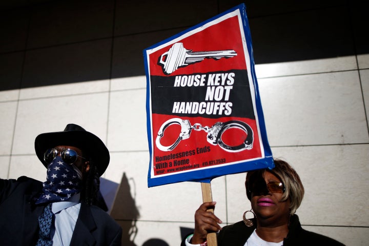 People protest in March against the killing of a mentally ill homeless man, who allegedly tried to grab an LA police officer'