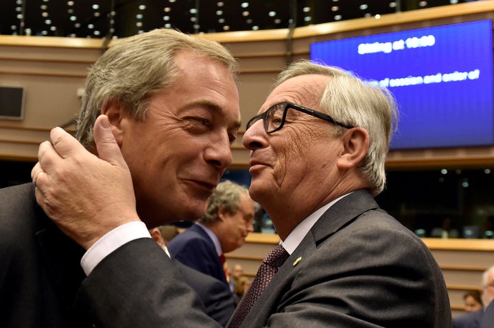 European Commission President Jean-Claude Juncker welcomes Nigel Farage, the leader of the United Kingdom Independence Party, prior to a plenary session at the European Parliament on the outcome of the Brexit" in Brussels, Belgium, on Tuesday.