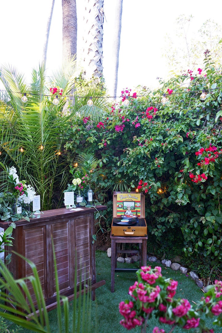 The small-but-mighty bar set-up, with bartending services provided by <a href="https://www.taskrabbit.com/?utm_source=tinycanalcottage&utm_medium=content&utm_campaign=may2016wedding_1" target="_blank">Task Rabbit</a>. 