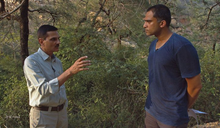 Interviewing Field Director Y.K. Sahu (Left) At The Scene Of The Saini Killing