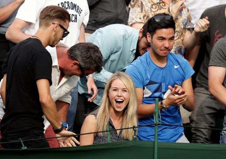 Marcus Willis girlfriend Jenny Bate celebrates his victory over Ricardas Berankis on day One of Wimbledon