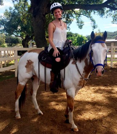 Actress Beth Behrs on her horse, Belle.
