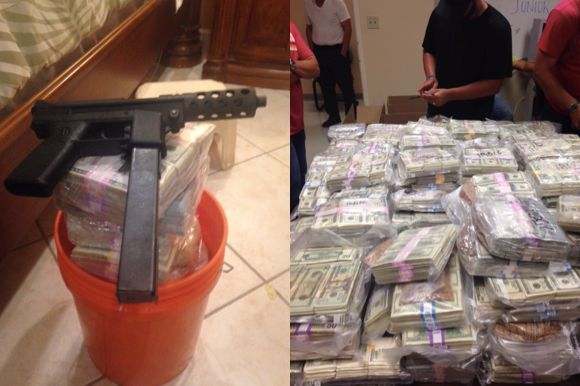 Authorities say in addition to the money they recovered this high-powered gun while raiding the Miami home.