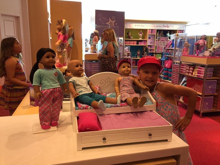 Mia was "ecstatic" to see bald American Girl dolls on display at the store.