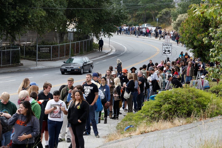 People wait in line to attend a campaign rally for Democratic U.S. presidential candidate Bernie Sanders in Santa Cruz, California, U.S., May 31, 2016.