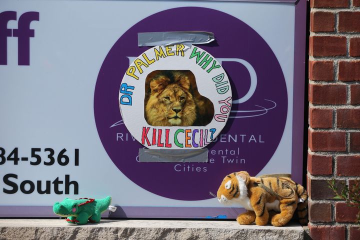 Protest signs placed outside of Walter Palmer's dental office in July, 2015.