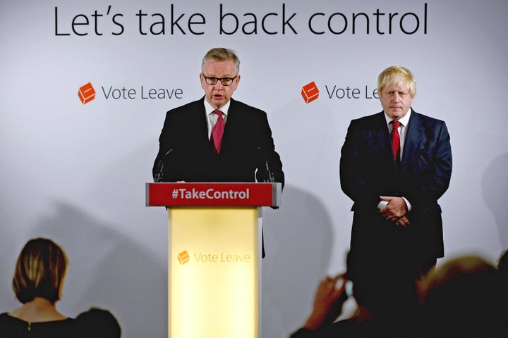 Michael Gove and Boris Johnson speak at Vote Leave headquarters after the vote. Gove upended Johnson's leadership bid, b