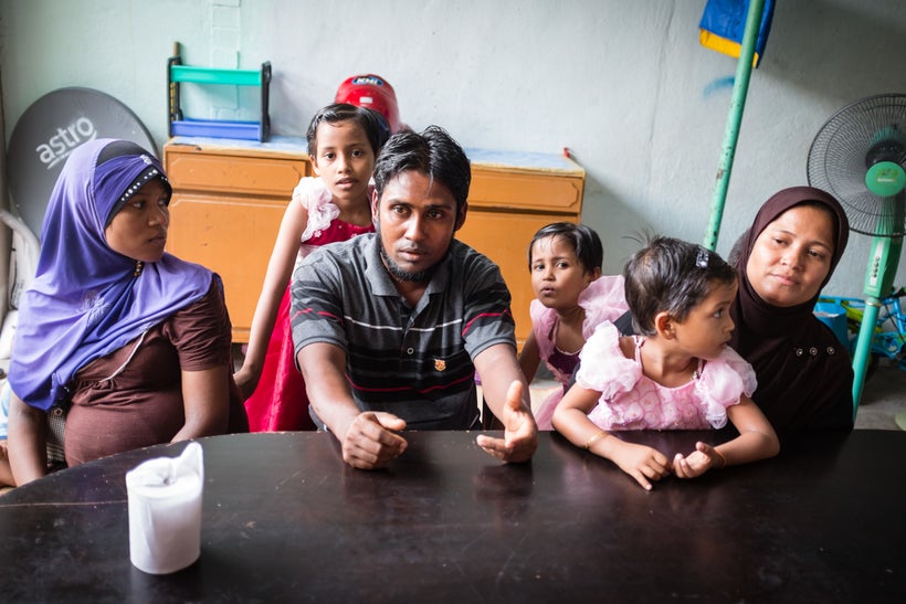 We met with two families. The couple on the left has 5 children. The husband wishes to get his official card in Malaysia, so