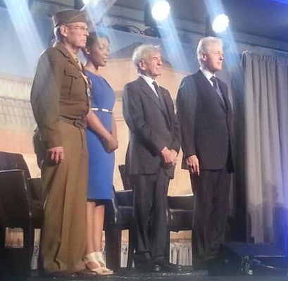 (l to r) World War II veteran and liberator Scottie Ooten, Community Partnerships Coordinator Rebecca Dupas, Elie Wiesel, and President Bill Clinton at the USHMM 20th Anniversary Tribute