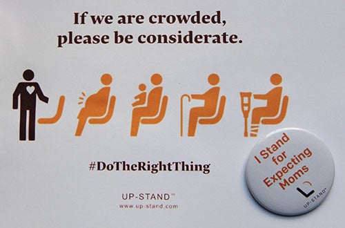 <i>Photo by Nancy A. Ruhling</i><br><strong>UP-STAND pins and signage.</strong>