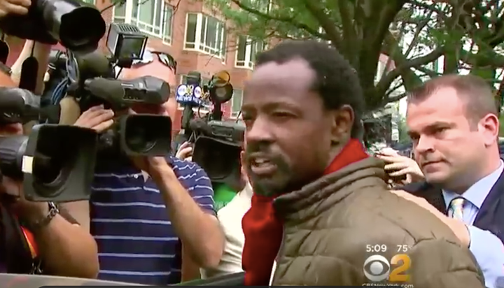Ekwan Hill, 42, is seen speaking to reporters after his arrest for allegedly attacking two women with feces Monday.