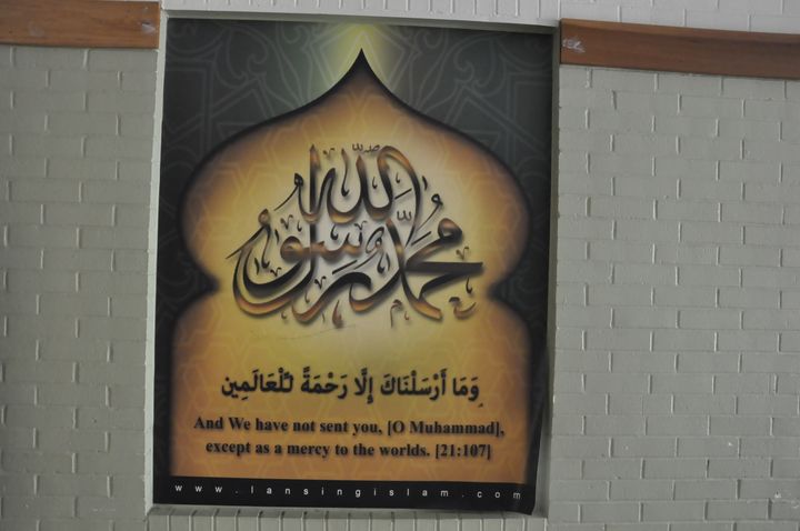 Posters adorn the walls of the masjid