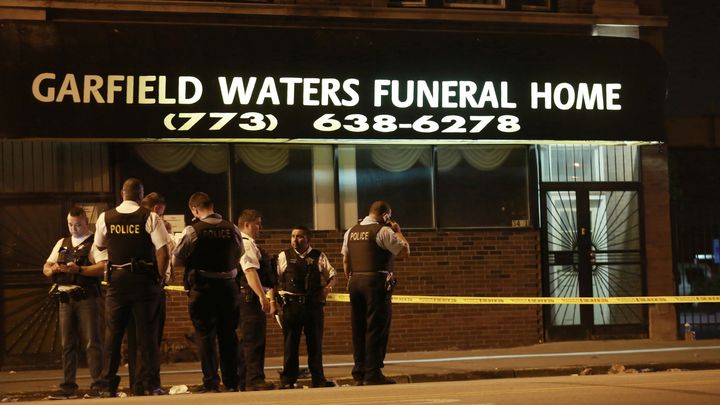 Police officers and sergeants investigate a fatal shooting on the 3400 block of West Madison Street early Saturday, June 18, 2016, in Chicago.