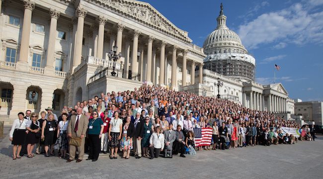 About 800 volunteers with Citizens Climate Lobby gather at the Capitol before lobbying congressional offices in June.