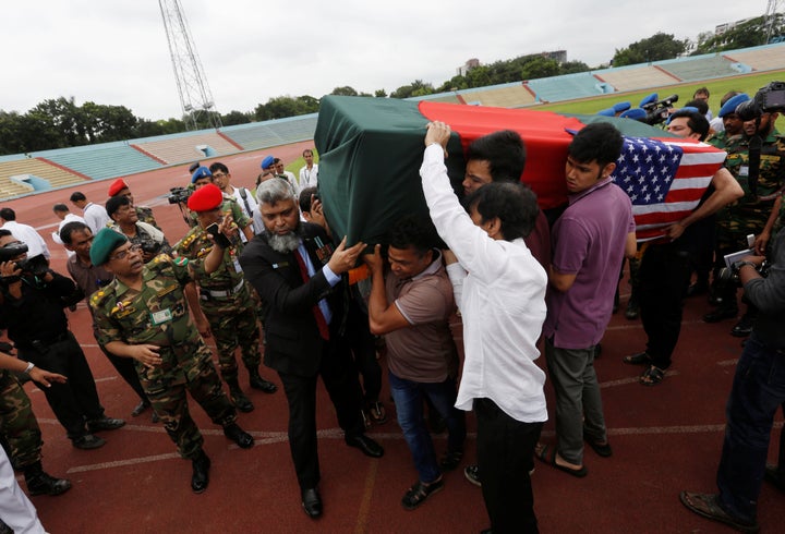 Relatives carry the coffin of a victim who was killed in the attack on the Holey Artisan Bakery and the O'Kitchen Restaurant,