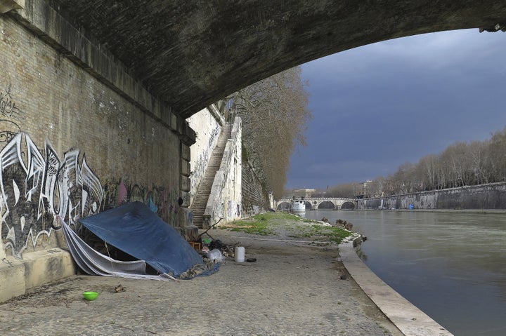 The neighborhood is near the Tiber River is popular with young people in Rome because of its many bars.