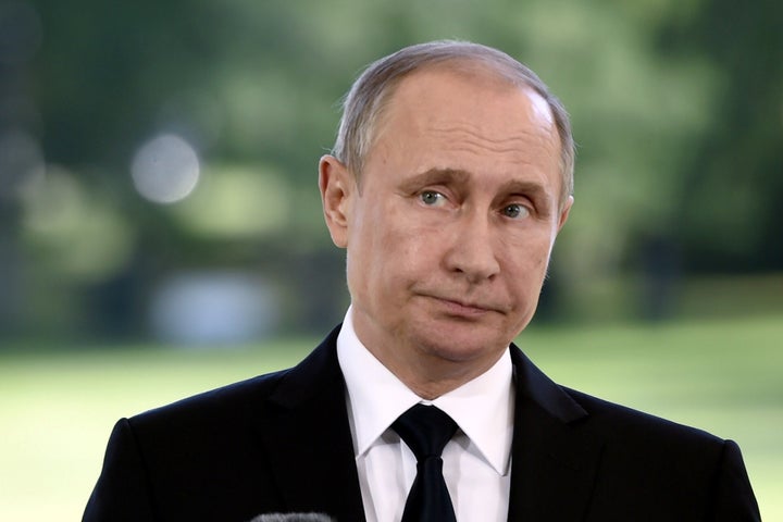 Russia's President Vladimir Putin reacts during his joint press conference with Finland's President Sauli Niinisto (not pictu