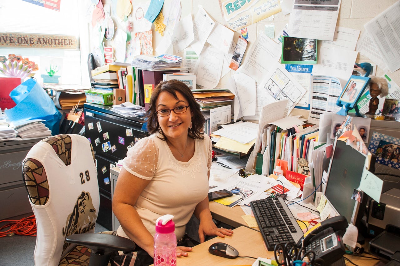 Maggie Sleman, the school's guidance counselor and anti-bullying specialist, poses in her office which turns into a safe space for children during lunchtime.