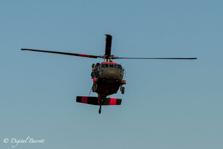 Returning from a day of assisting Cal Fire, the Cal Guard Black Hawk returns to Mather Airfield in Rancho Cordova.