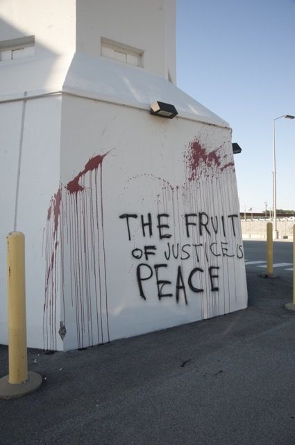 The three activists reached the Highly Enriched Uranium Materials Facility where they splashed blood and painted peace statements in a protest against nuclear weapons.