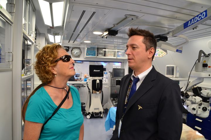Ann Humphries talks with Dr. Antonio Jaramillo, MD and Head of Ophthalmology for the ORBIS Flying Eye Hospital in the Operating Room of the new MD 10 donated to ORBIS by FedEx. 