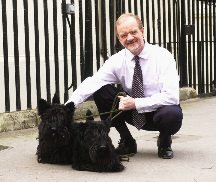 Robin Cook with his dogs Tammy and Tasker died in 2005