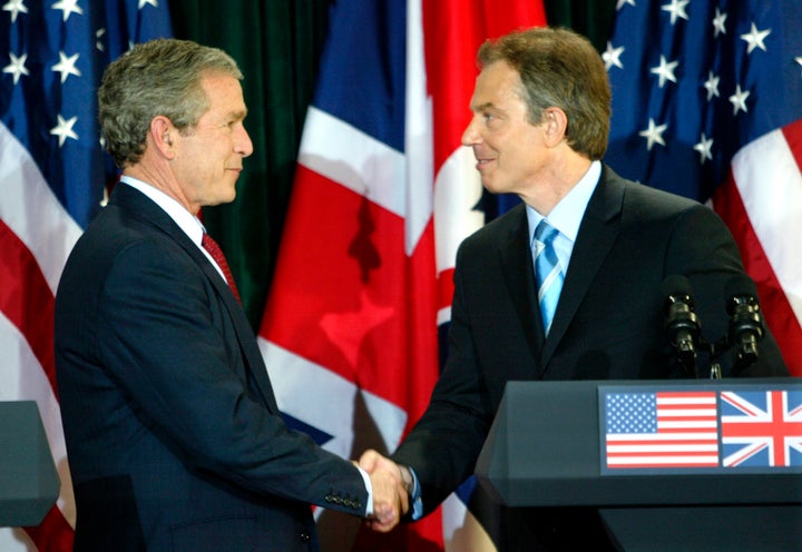 President George W. Bush and British Prime Minister Tony Blair in April, 2003. The the inquiry said that Blai