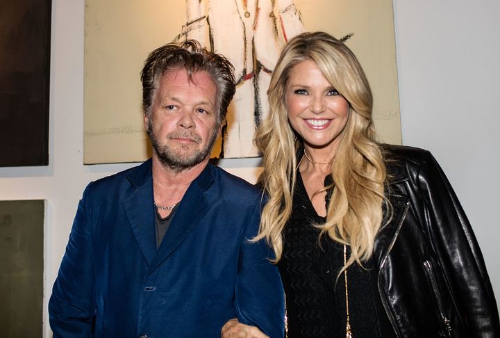 Christie Brinkley and John Mellencamp = proof that opposites attract.