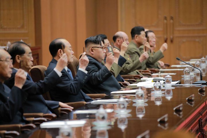 North Korean leader Kim Jong Un (C) attends the Fourth Session of the 13th Supreme People's Assembly (SPA) of North Korea.