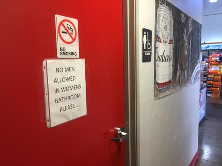 A sign on the women's bathroom door at a Texaco Station and BBQ in a North Texas restaurant seems to make clear the