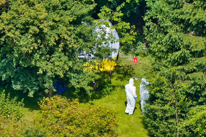 <strong>Forensics teams at the scene </strong>