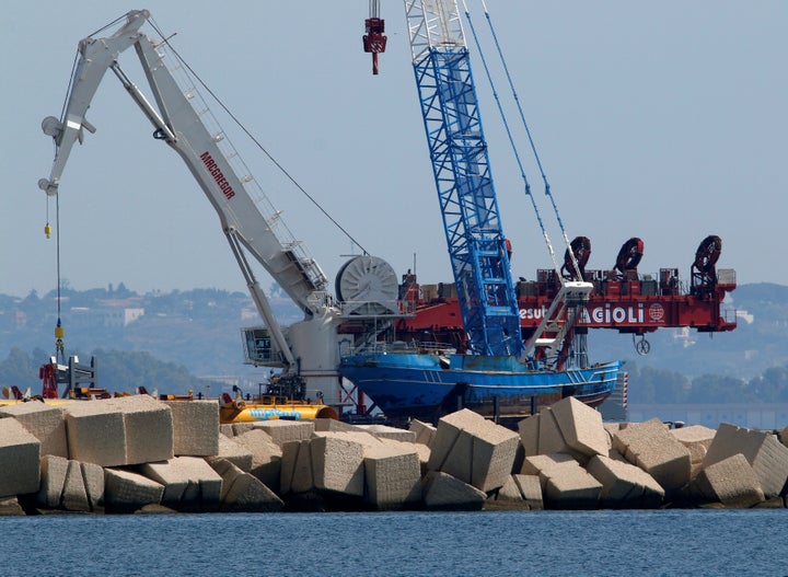 Italian teams worked this month to lift the wreck of the fishing boat that sank and drowned hundreds of migrants in April 2015.