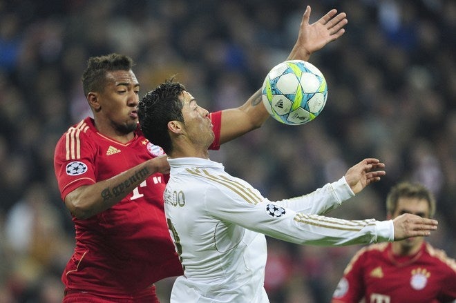 Boateng applying pressure to Ronaldo