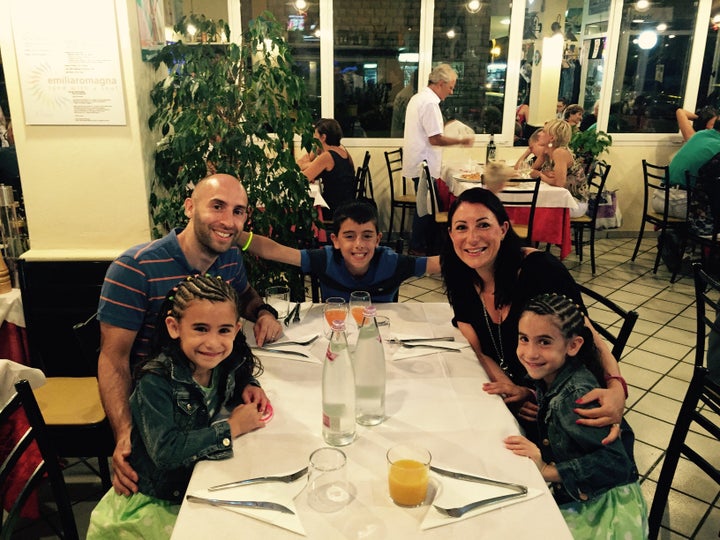 Suzy Pelta with her husband Tal, their son Louis and twin daughters Gracie (right) and Amelie (left).