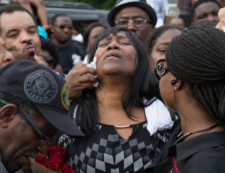Sandra Sterling mourns at a community vigil in memory of her nephew Alton on July 6.